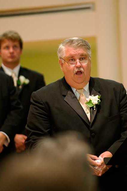 Cousin Jon, father of the bride, singing one hell of a “Lord's Prayer”.